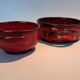 Red ceramic pieces by Gérard Hoffman (1917/1965).