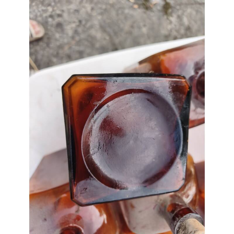 Set of 41 brown glass pharmacy bottles.