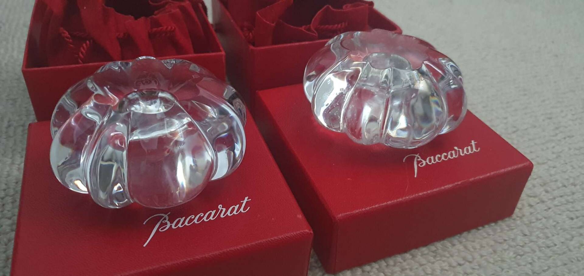 Pair of Baccarat crystal candlesticks, flower/rose model — new condition