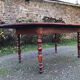 Antique cherry wood farmhouse table with rounded ends