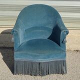 Fauteuil crapaud en velours bleu