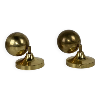 Pair of Guzzini brass spherical wall lights, 1970