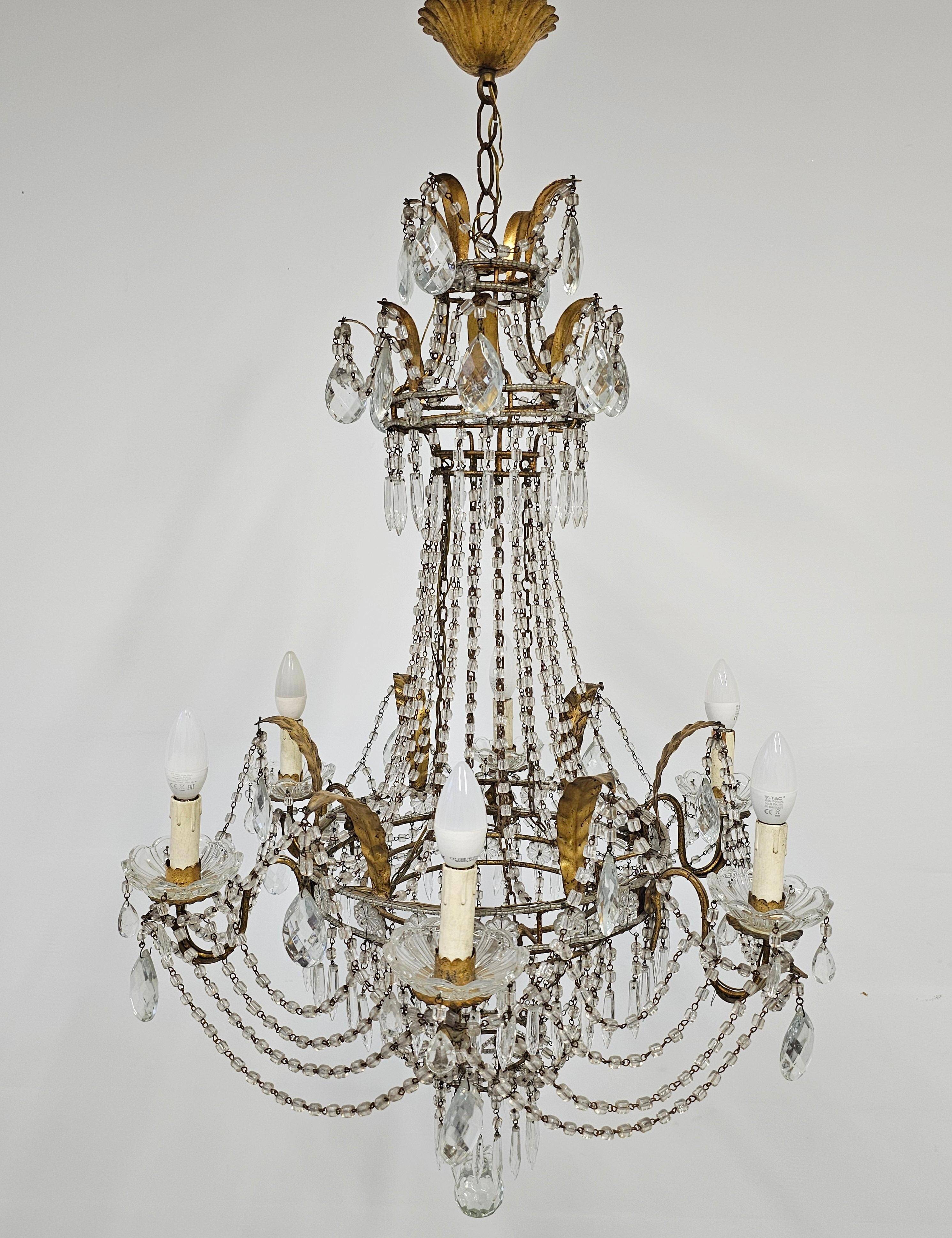 Antique crystal chandelier with floral details 1910