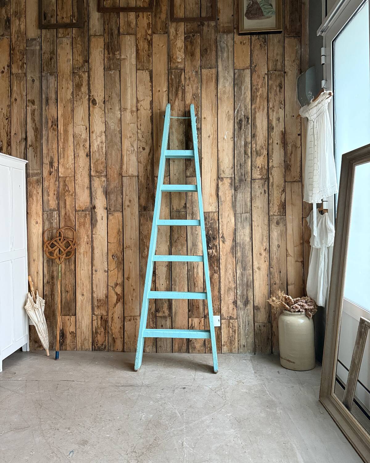 Vintage stepladder with turquoise patina