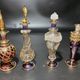 Set of 8 blown glass perfume bottles gilded with 12 carat gold
