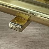 Tubular wall sconces in brass, Italian design from the 1970s, attributed.