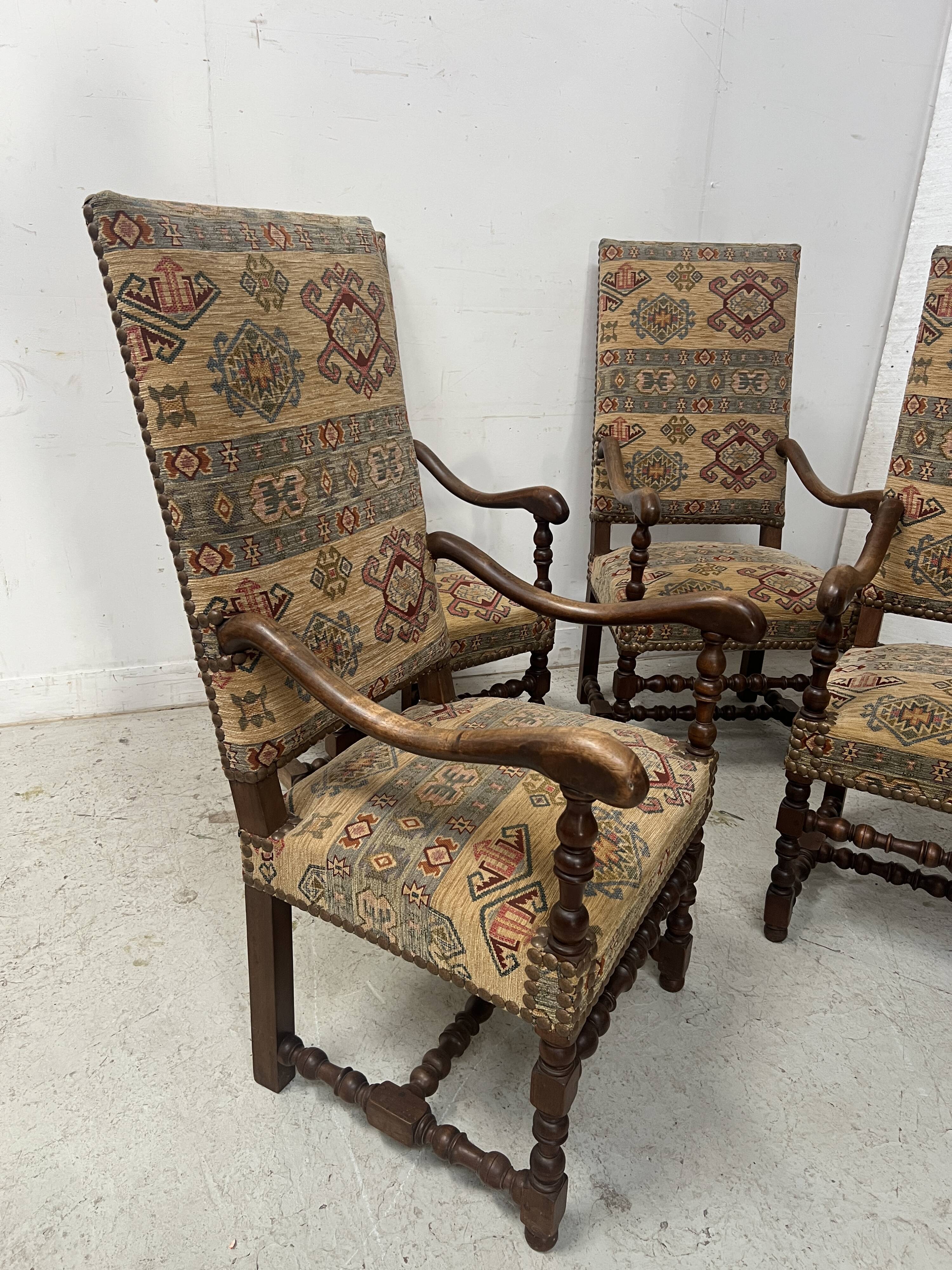 Set of four Louis XIII style high-back armchairs, 20th century.
