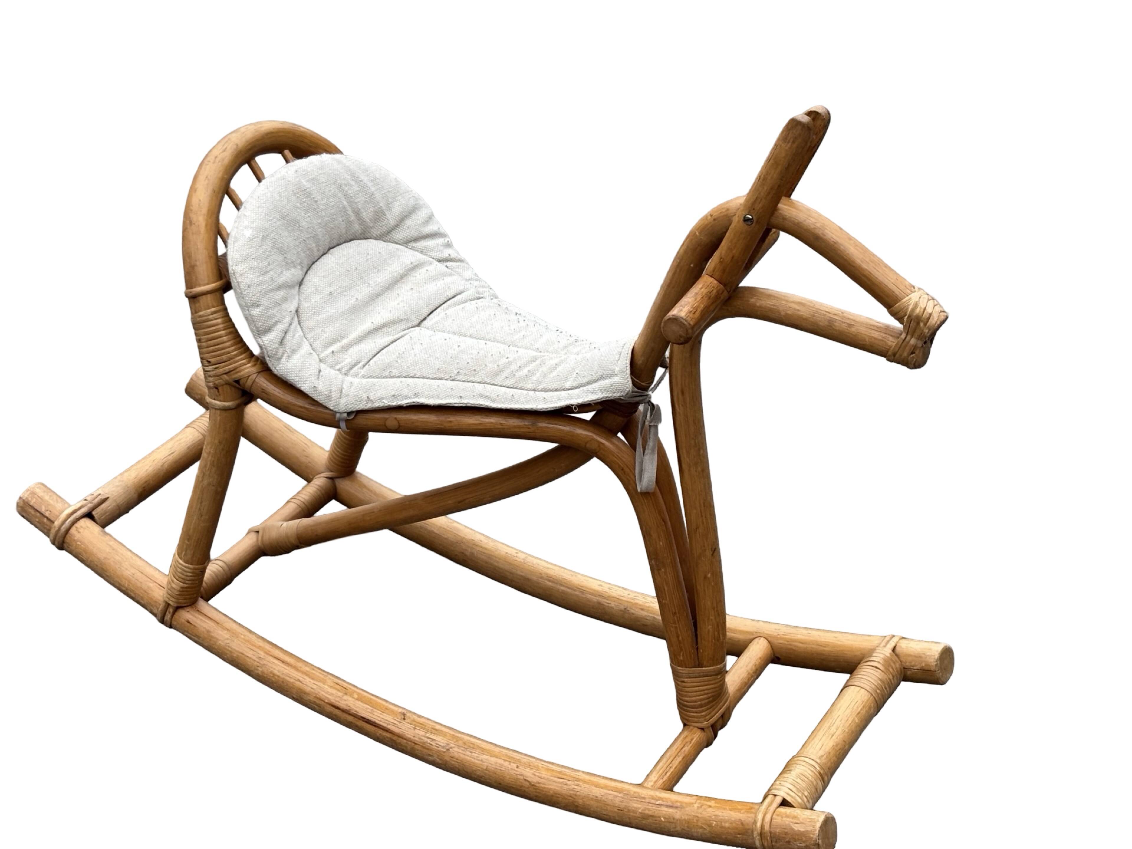Vintage rattan rocking horse for a 1960s nursery design