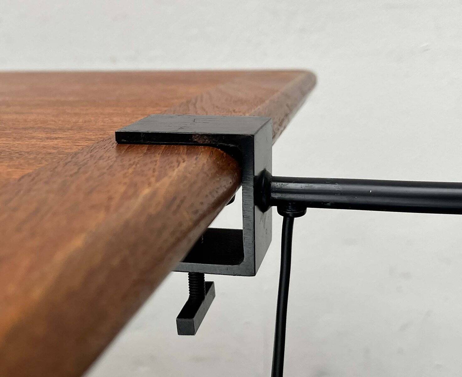 Mid-century minimalist Swiss clamp table lamp by the SLZ team for Swisslamps International, 1960s.