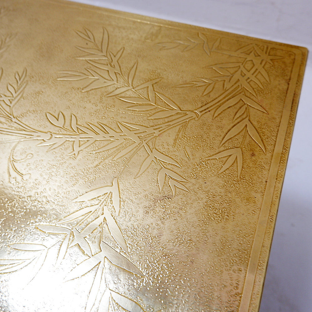 Brass coffee table engraved in the style of Christian Krekels, Belgium 1977.