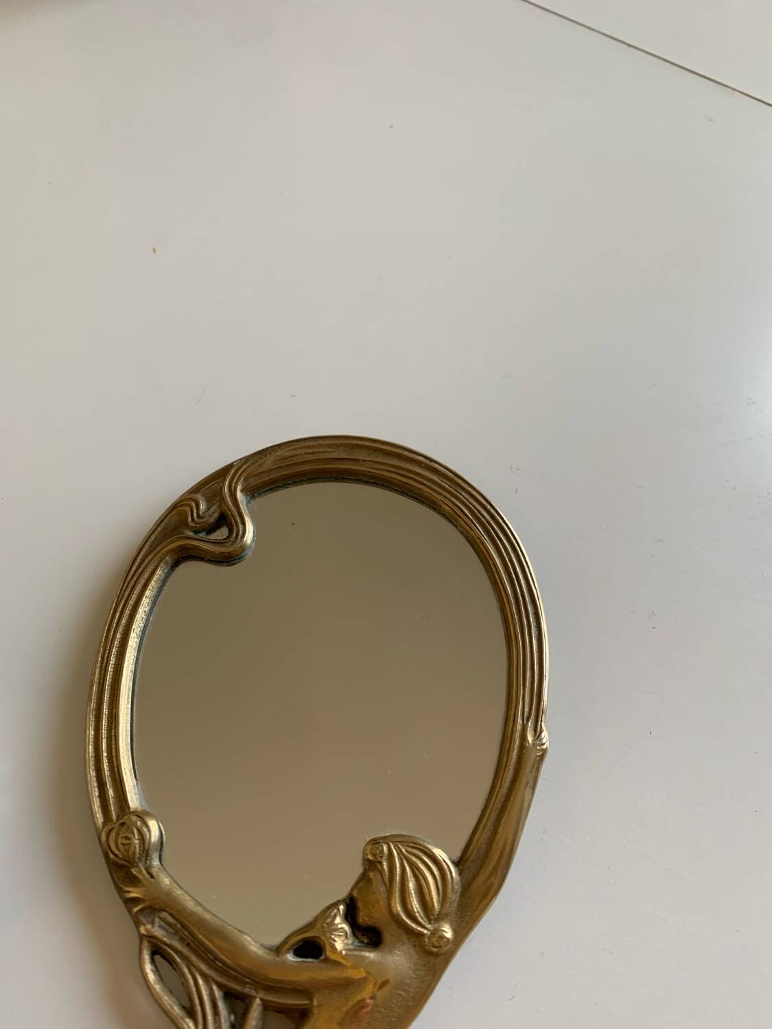 Art Nouveau brass mirror for women