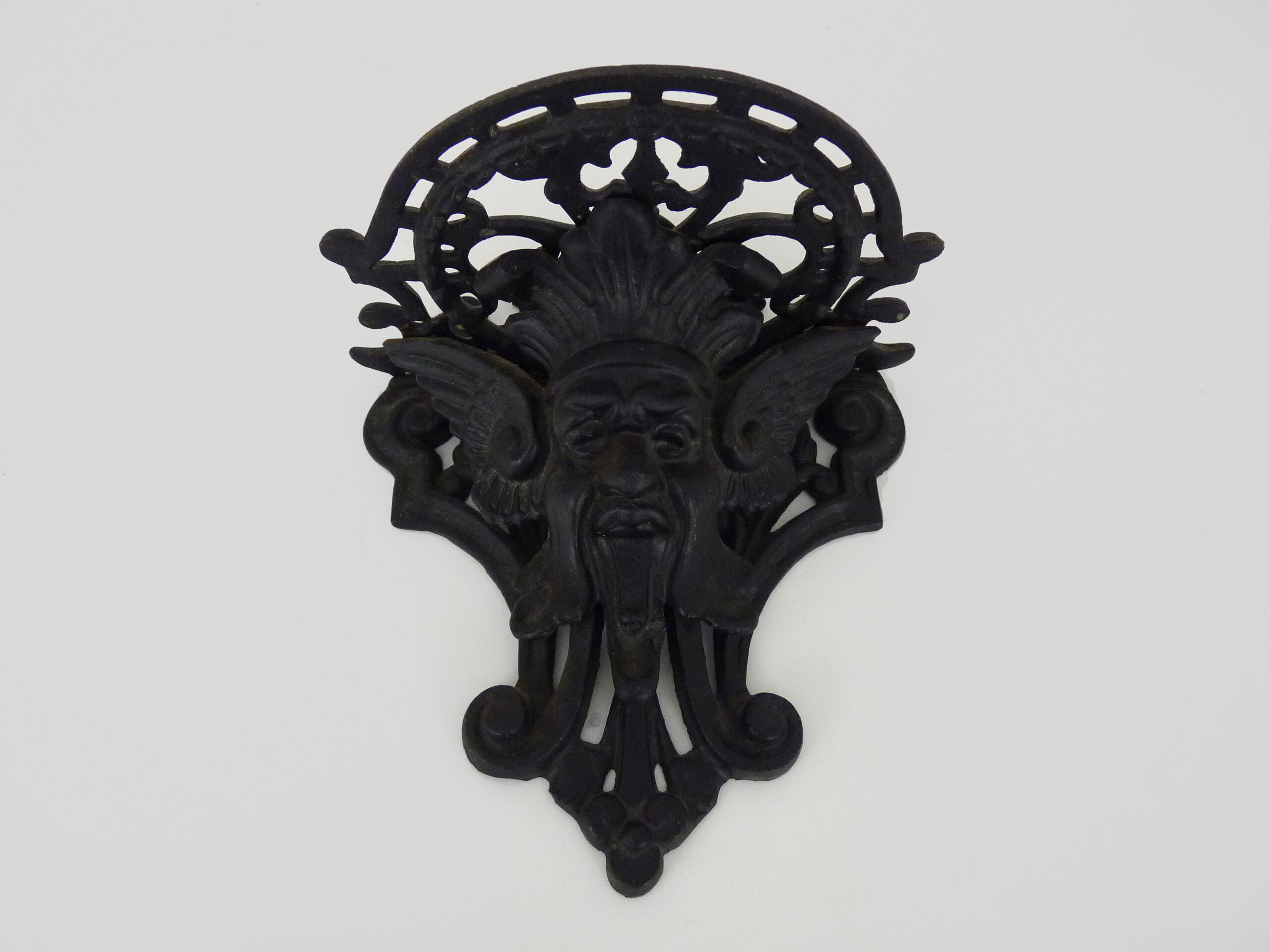 Harness, plant door, wall statue door with devil's head