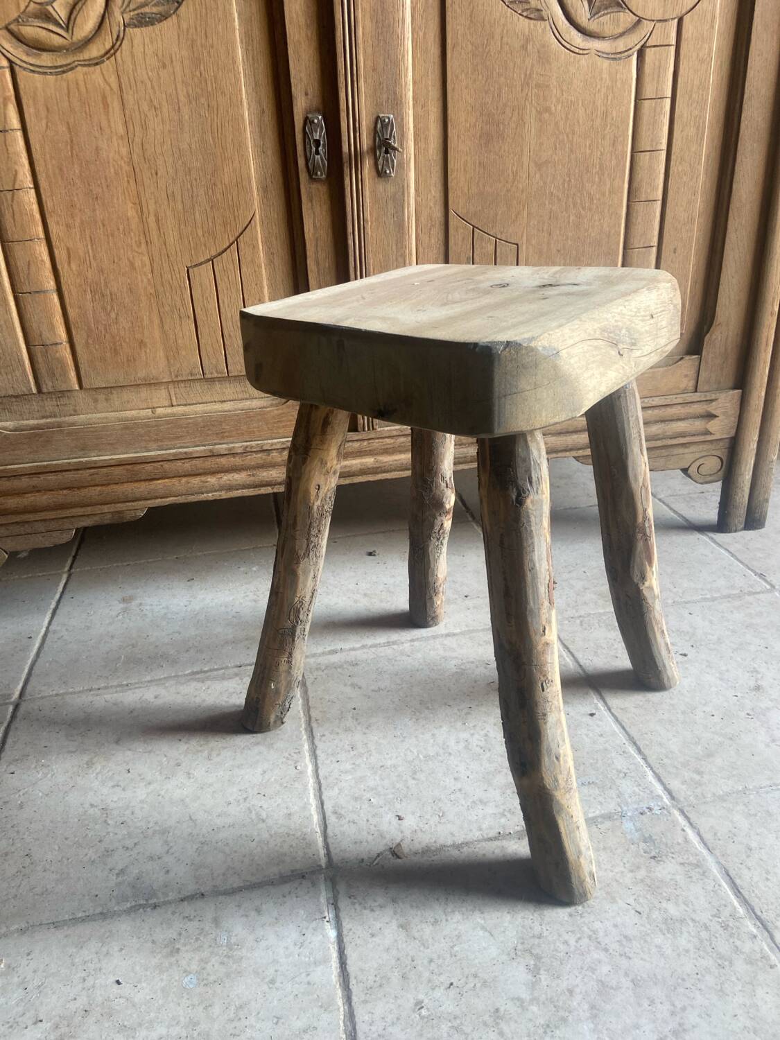 Antique brutalist stool in solid oak