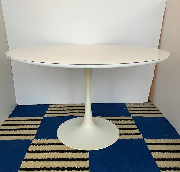 White dining table with tulip base by Maurice Burke