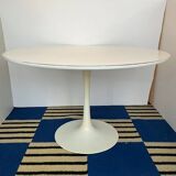 White dining table with tulip base by Maurice Burke