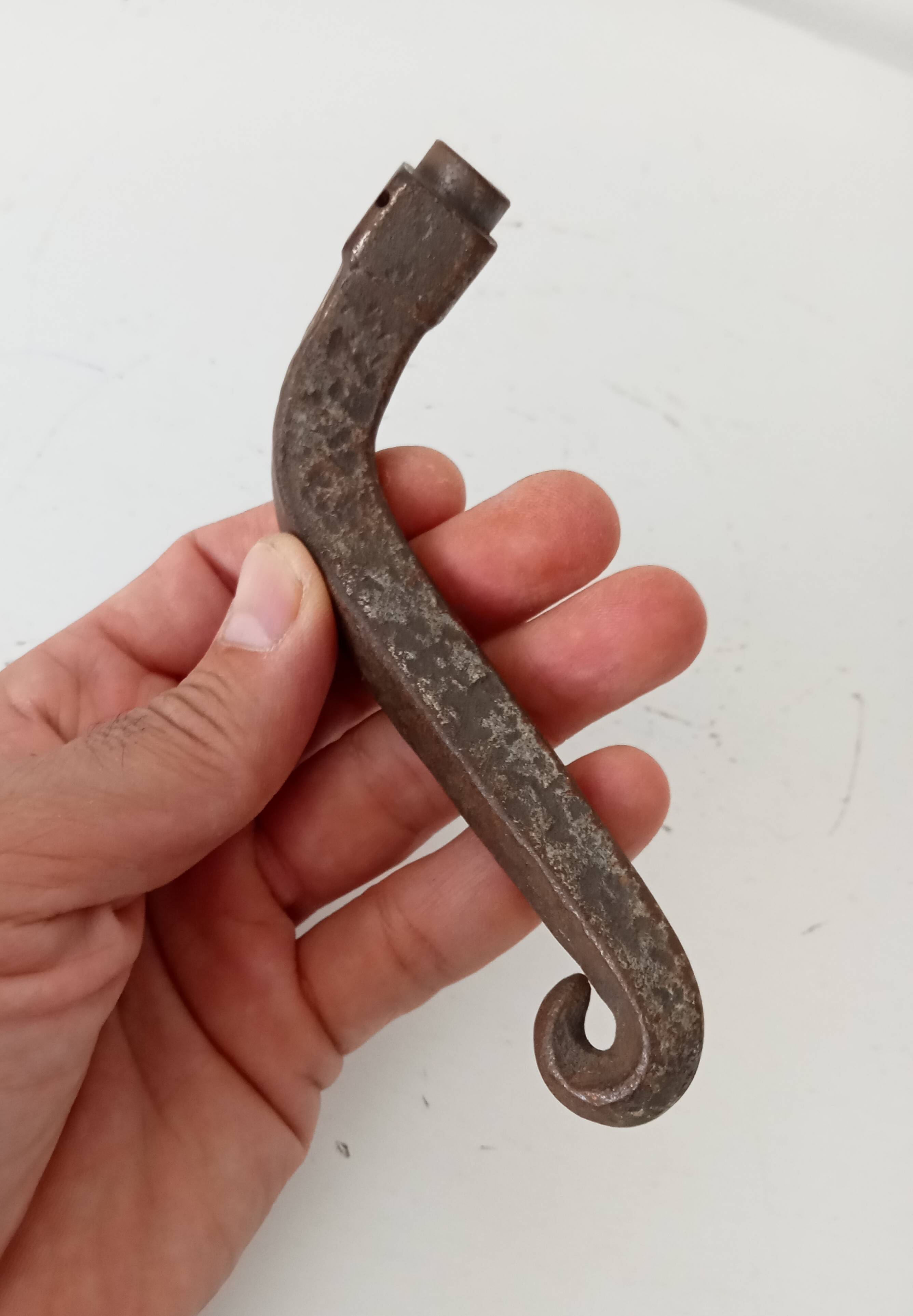 19th-century antique door handle in forged steel