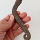 19th-century antique door handle in forged steel