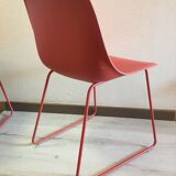 Red muuto "visu" chairs with sled base