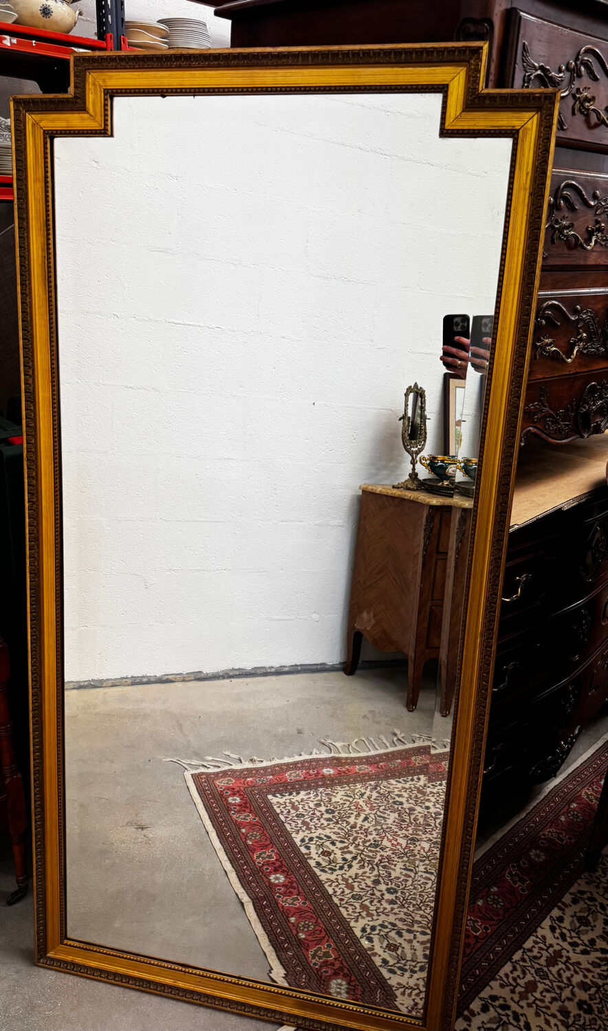 Large gold mirror in the Louis XVI style