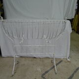 White wrought iron cradle