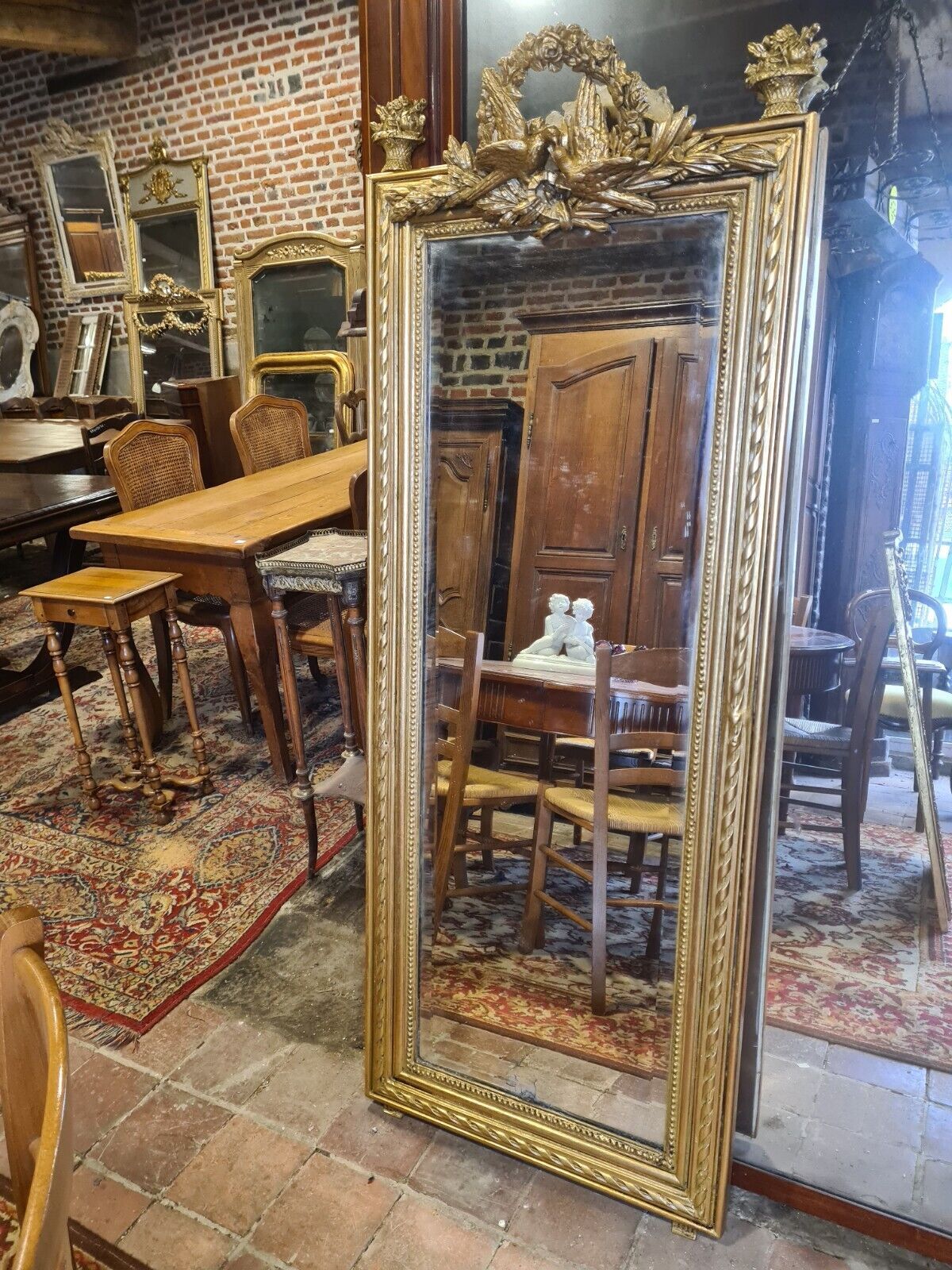 Golden mirror with doves