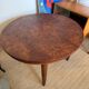 Oval extendable dining table in wood and walnut burl veneer.
