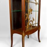 Art Nouveau display case, bronzes and carved wood on a floral theme, circa 1900