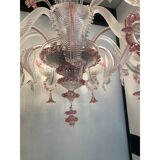 Chandelier in transparent and pink Murano-style glass with flower and leaf.