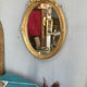 Miroir oval en bois doré 70x49cm