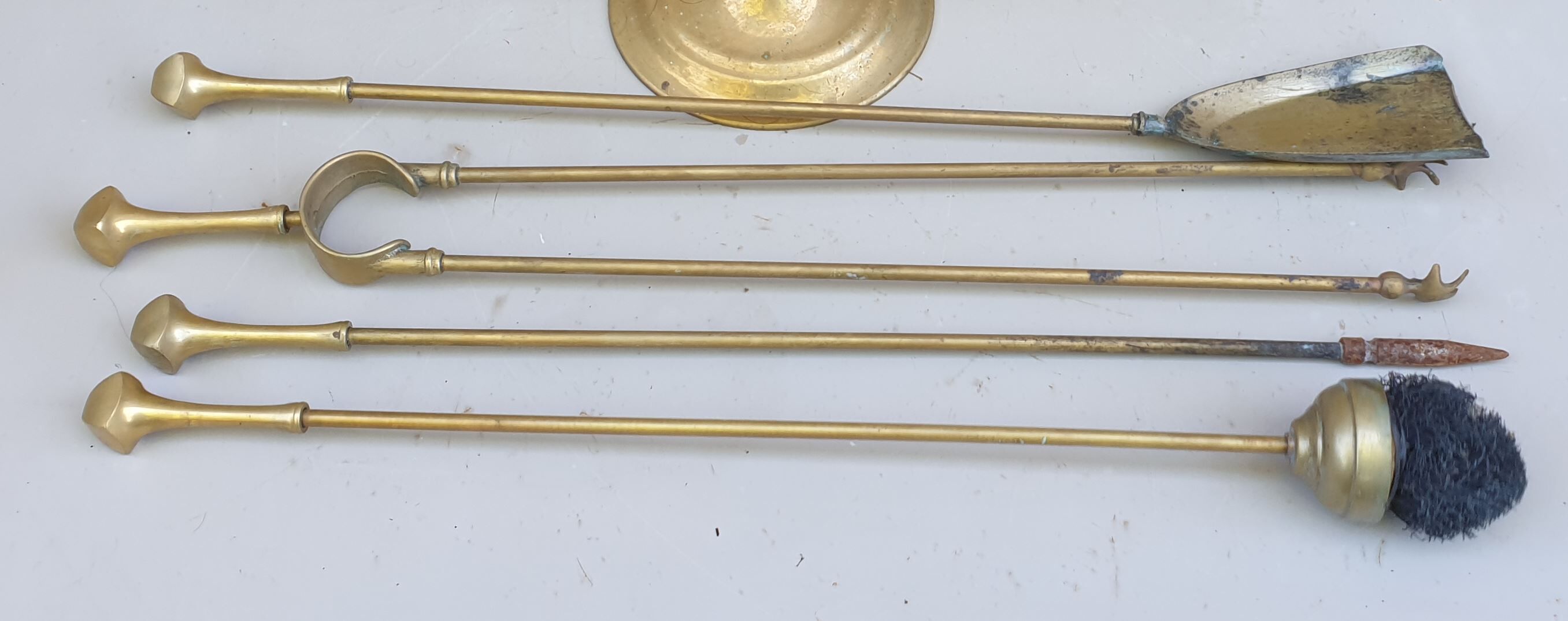 Brass fireplace servant