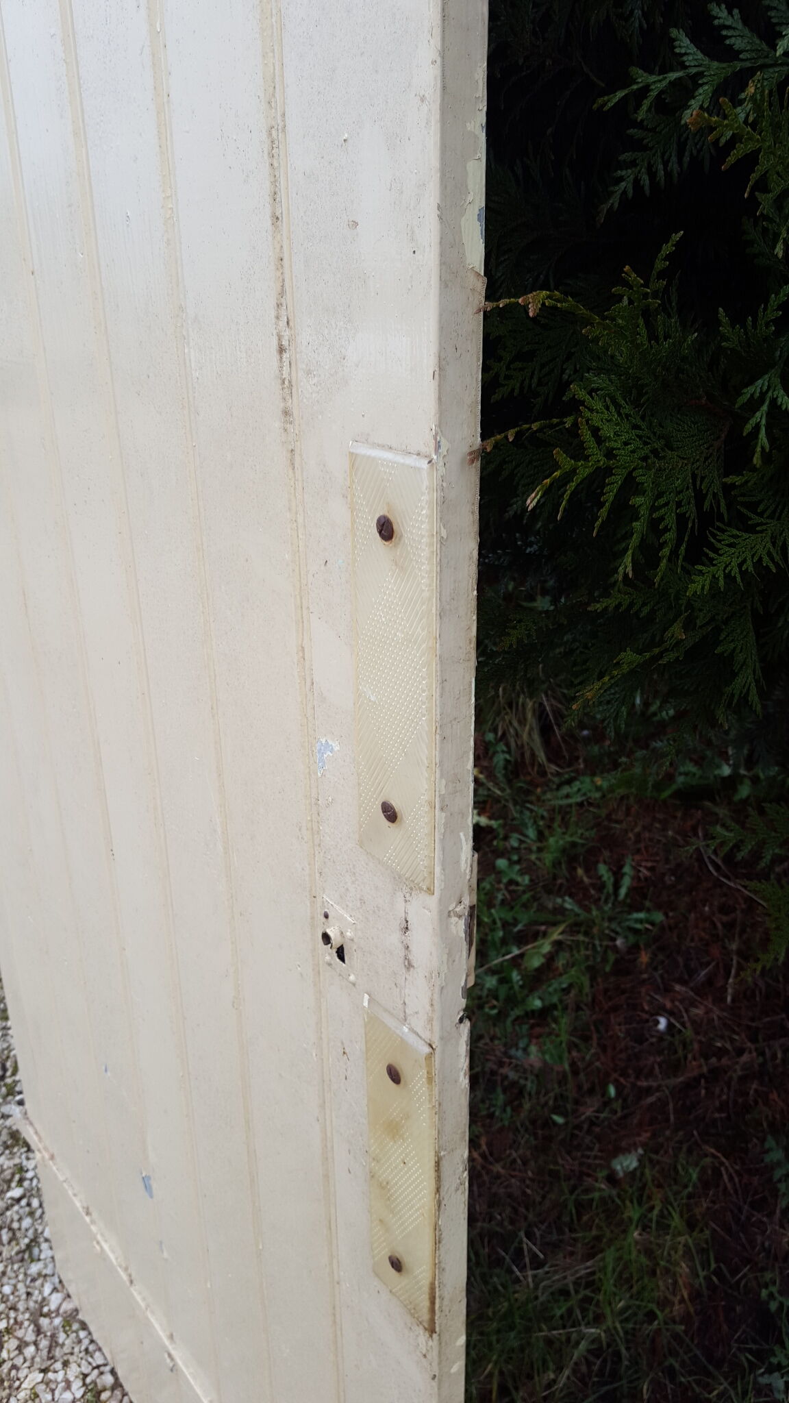 Old door in cream lacquered wood