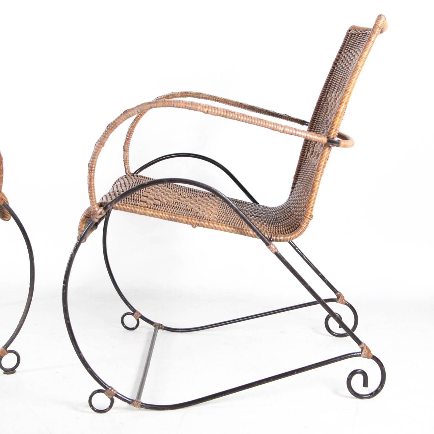 Pair of rattan and iron armchairs