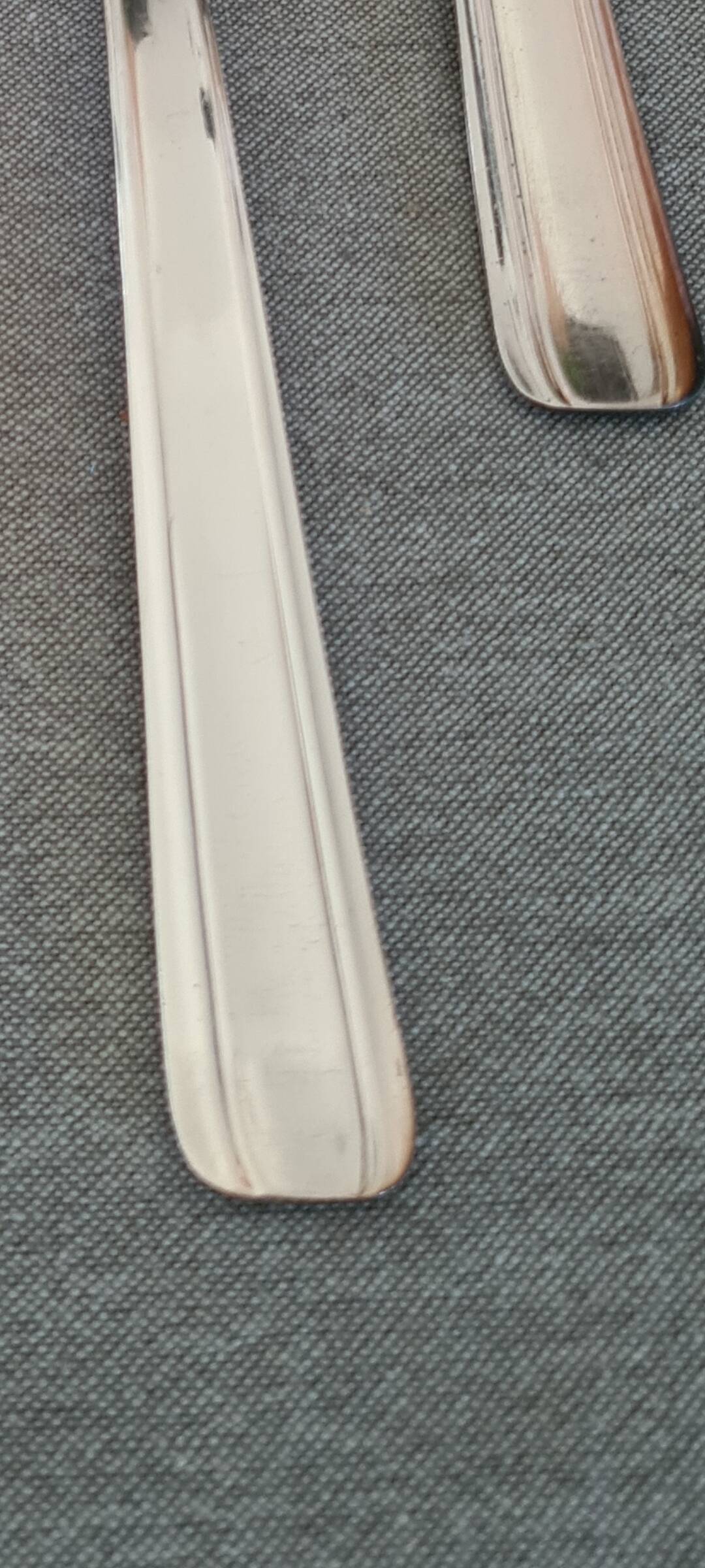 Silver metal cutlery