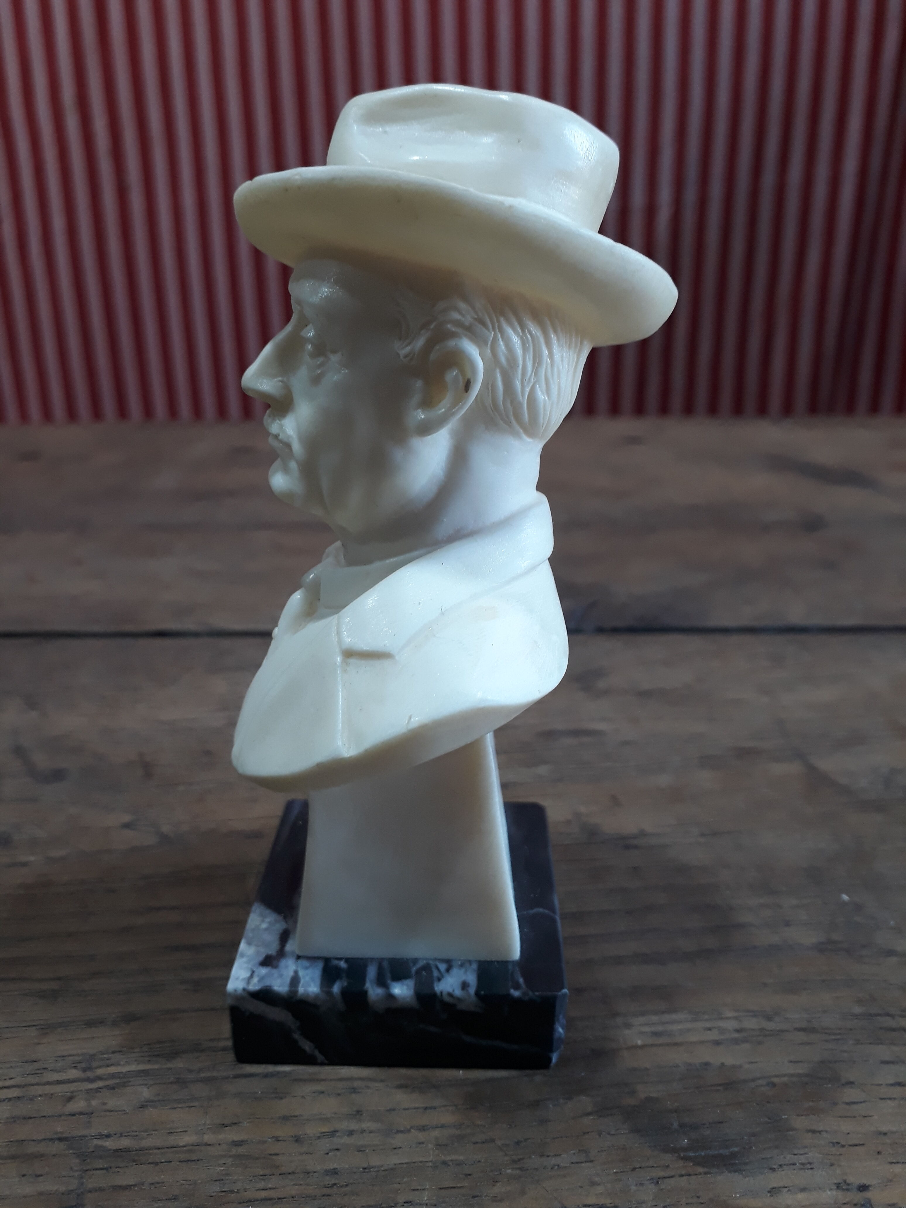 Resin bust by Puccini, marble base