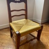 Low chair in wood and woven straw