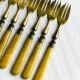 Set of 8 vintage gold metal dessert forks