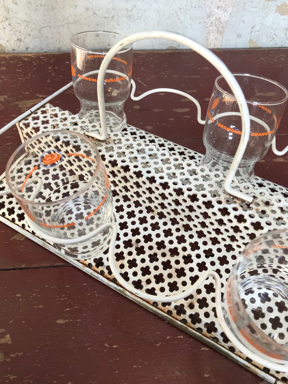 Perforated metal glass basket