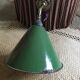 Enamelled sheet metal wall light