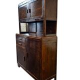 Vintage wooden display cabinet with yellow glass.