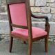Pair of Empire armchairs, Consulate, walnut and velvet, 19th century.