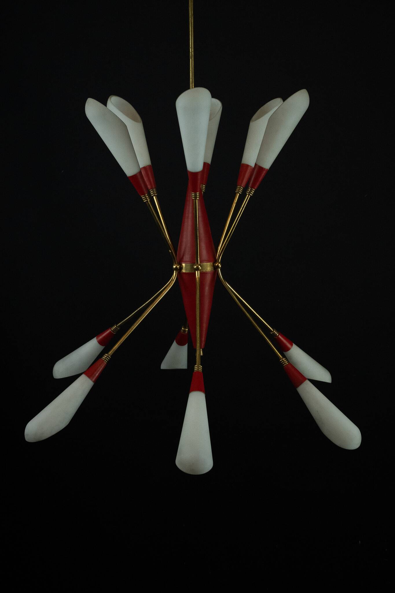 Mid-Century 12 lights chandelier in the manner of Stilnovo. Italy 1950s