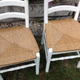 White farmhouse table set and four chairs