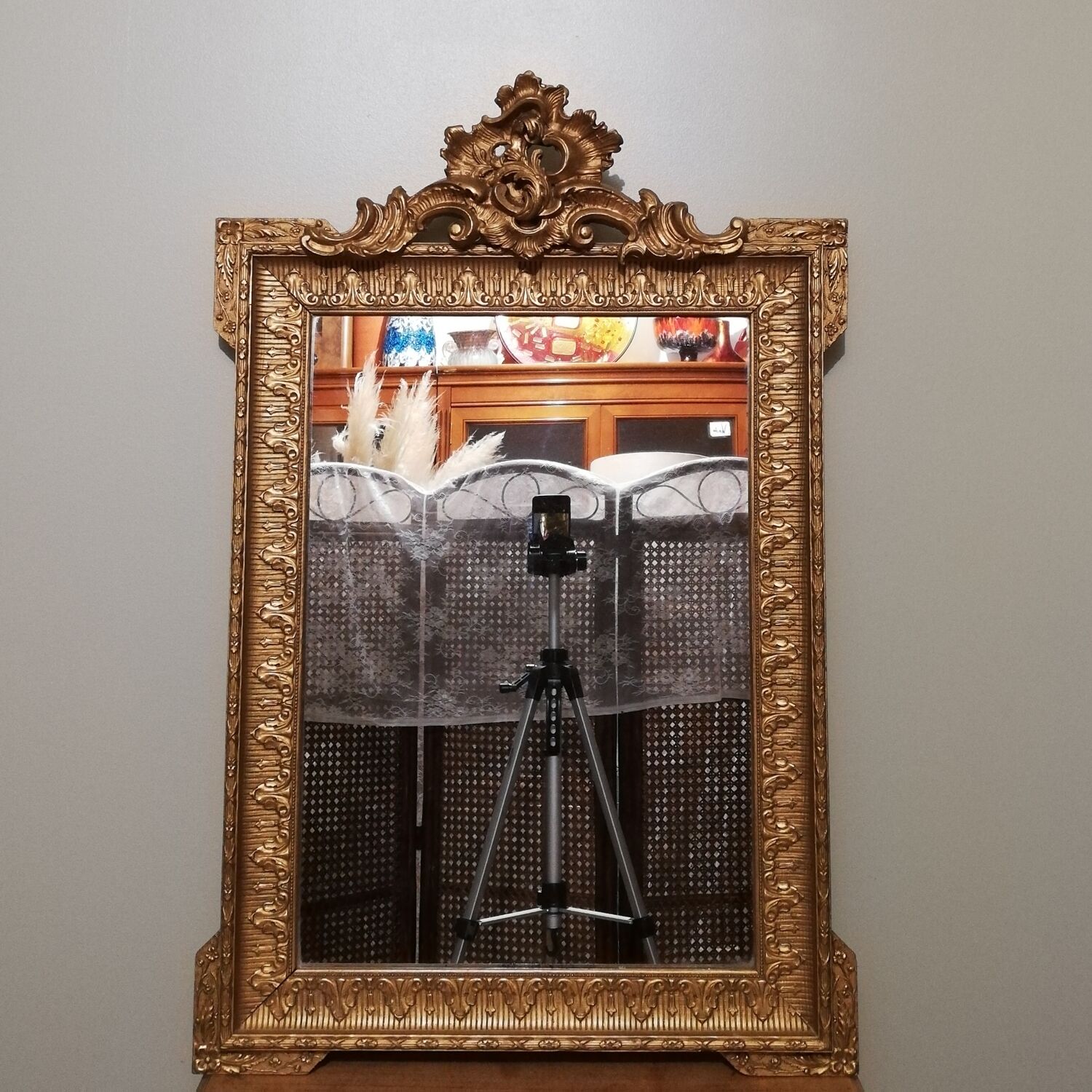 Mirror with pediment rocaille in gilded wood and stucco Louis XV style