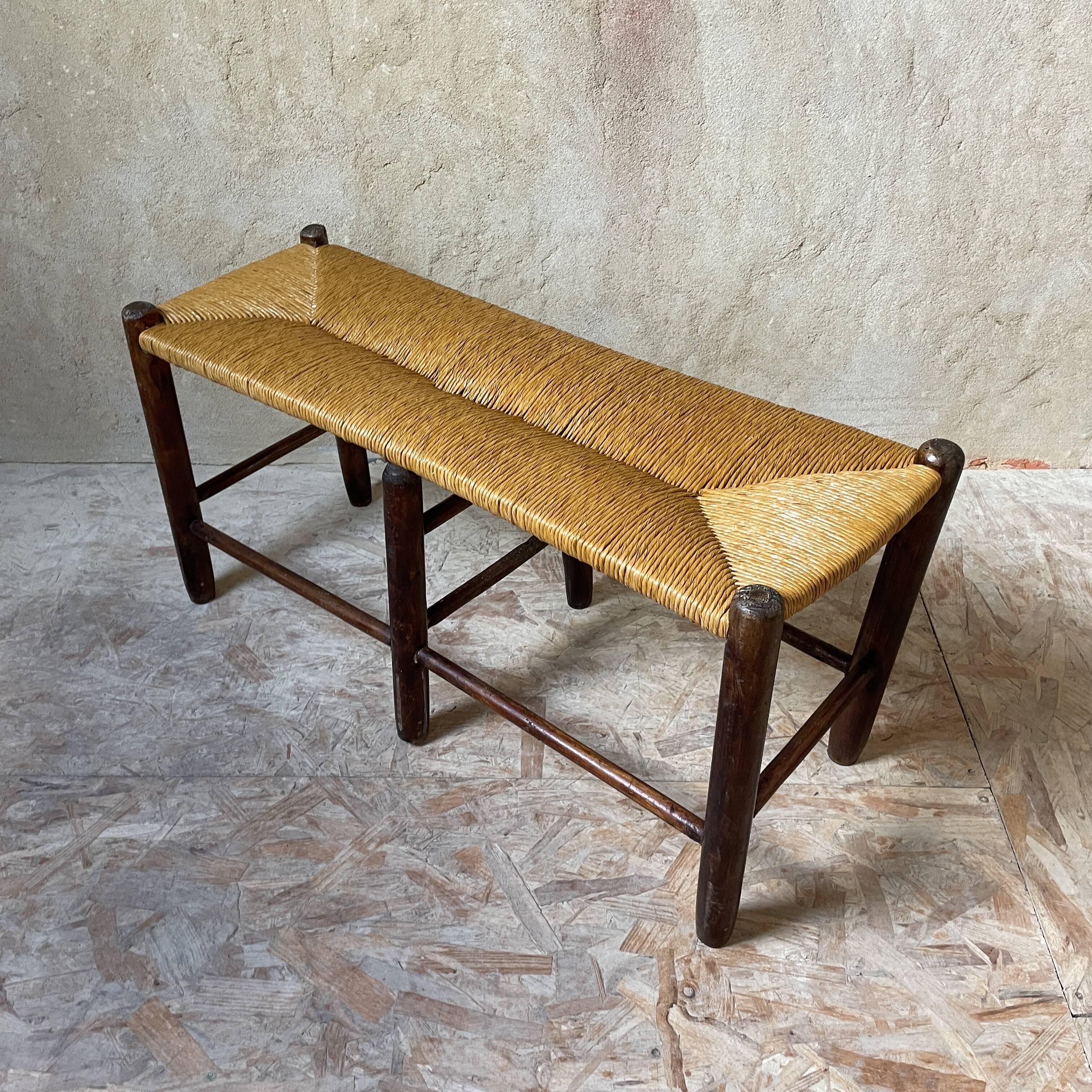 Wooden bench and rustic straw