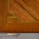 Small desk table in rosewood and rosewood marquetry, Louis XVI style – early 20th century.