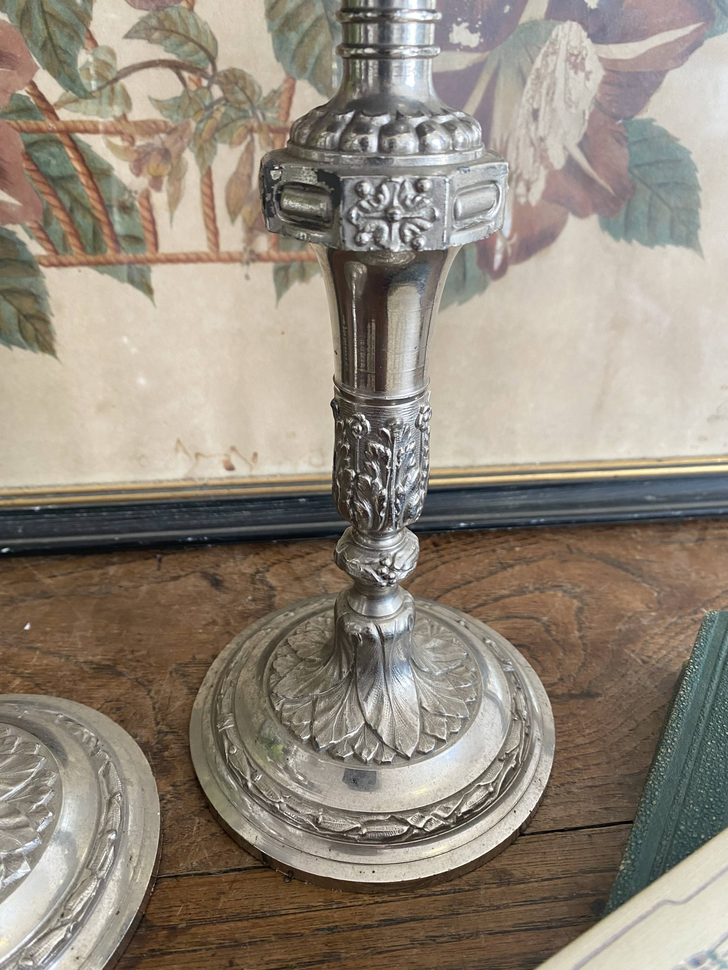 Antique silver-plated metal candlesticks