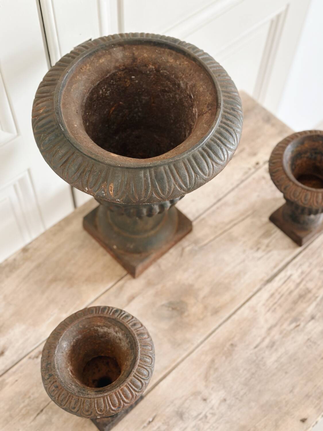 Set of three Medici cast iron vases
