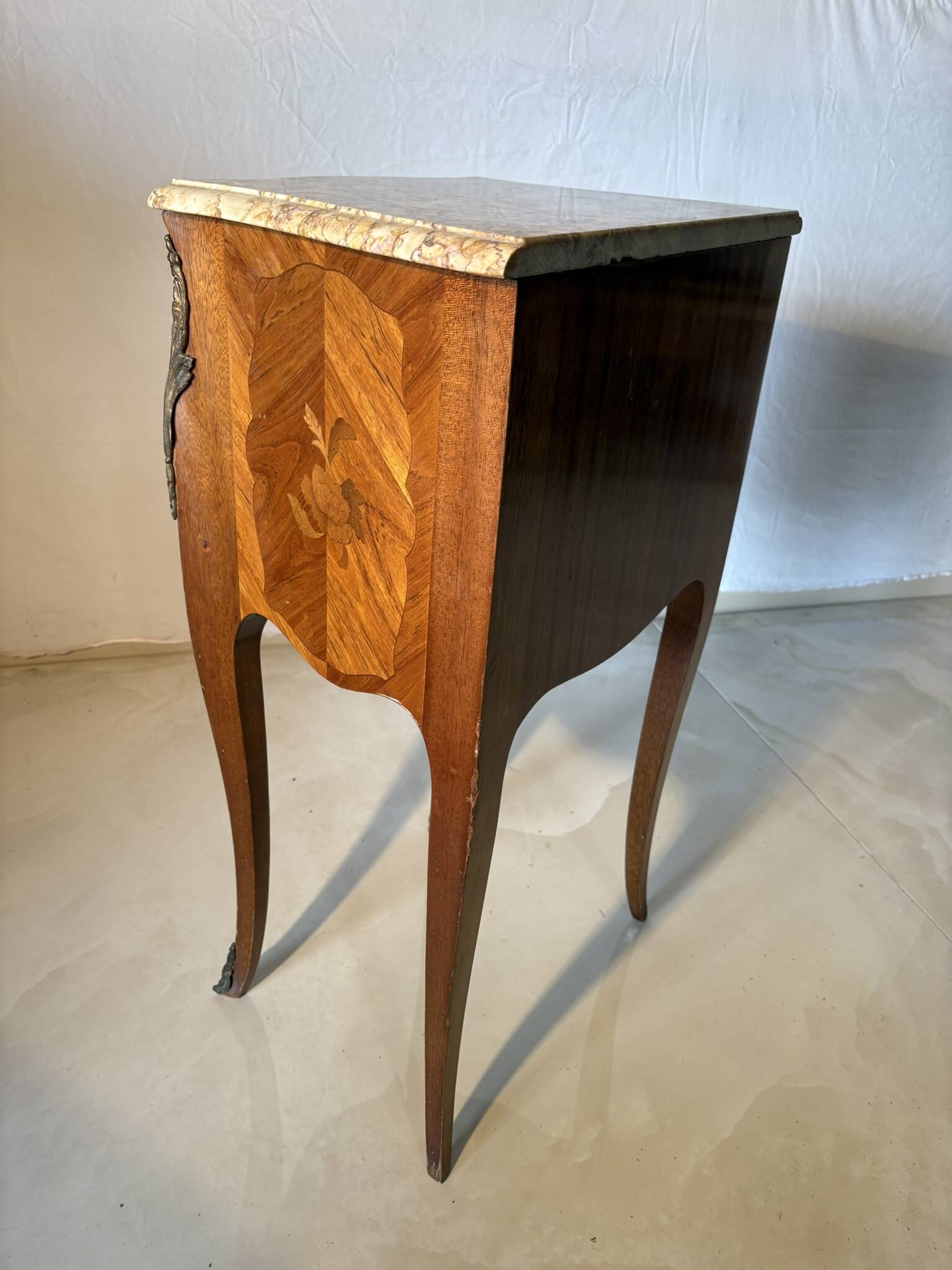 Small curved Louis XV style piece of furniture – marquetry and marble top