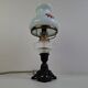 1960s Czechoslovakian milk glass oil lamp style table lamp with red windmill