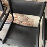 Pair of black armchairs